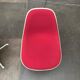 Mid-century fiberglass accent chair set with La Fonda base by Charles & Ray Eames for Herman Miller.