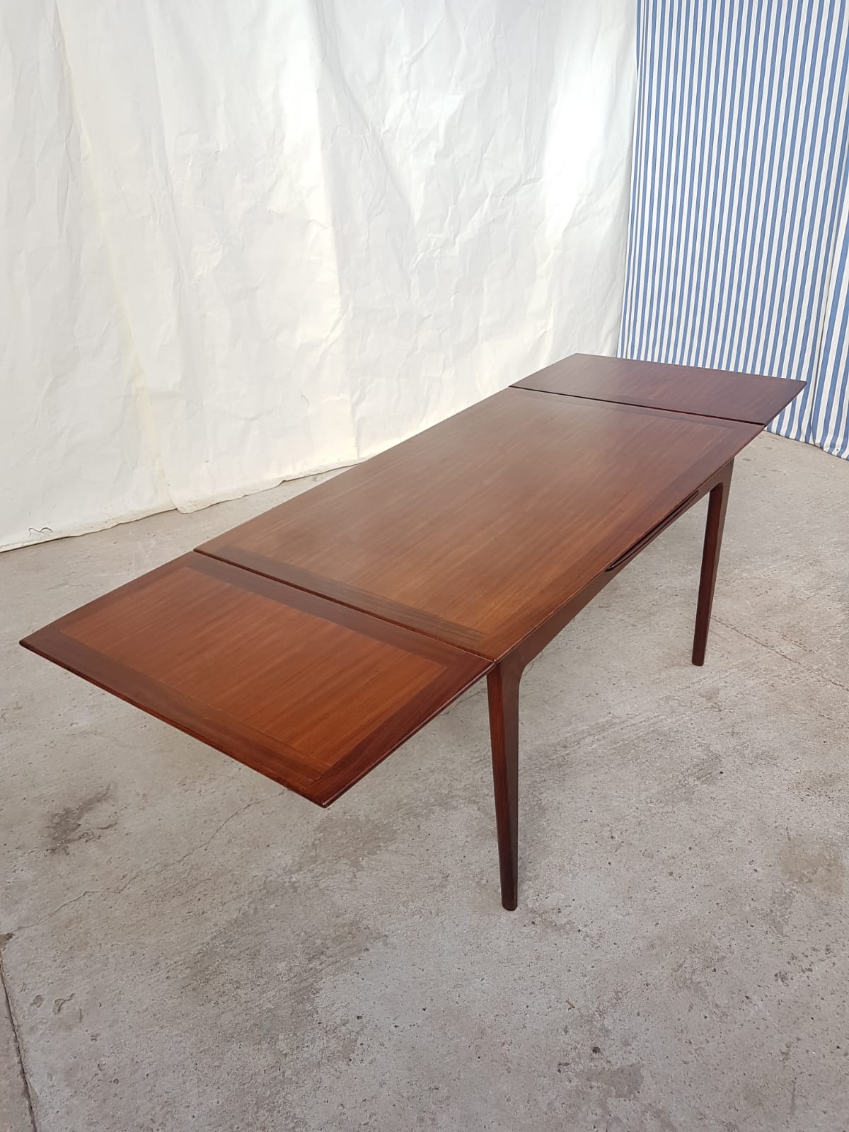 Teak extending dining table by Younger