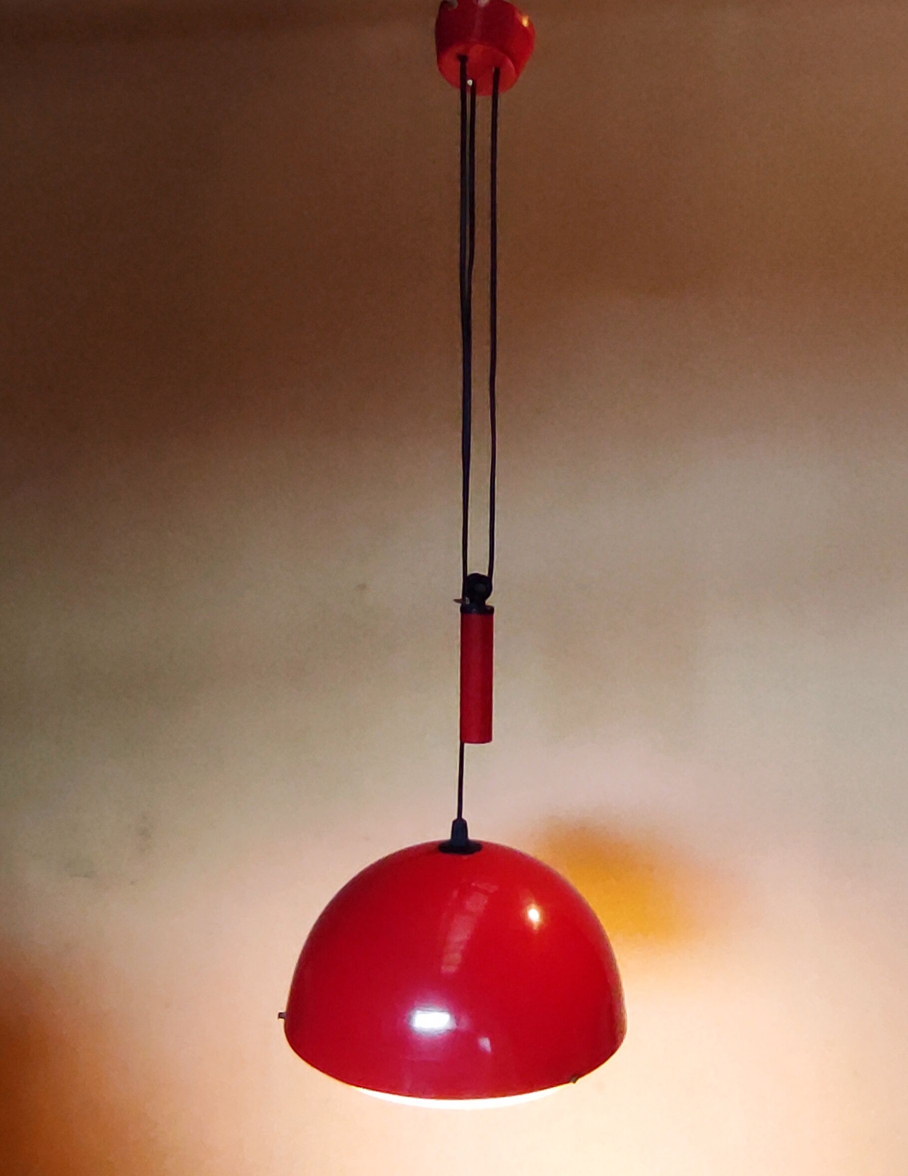 Old Italian vintage suspension rises and falls red 70s