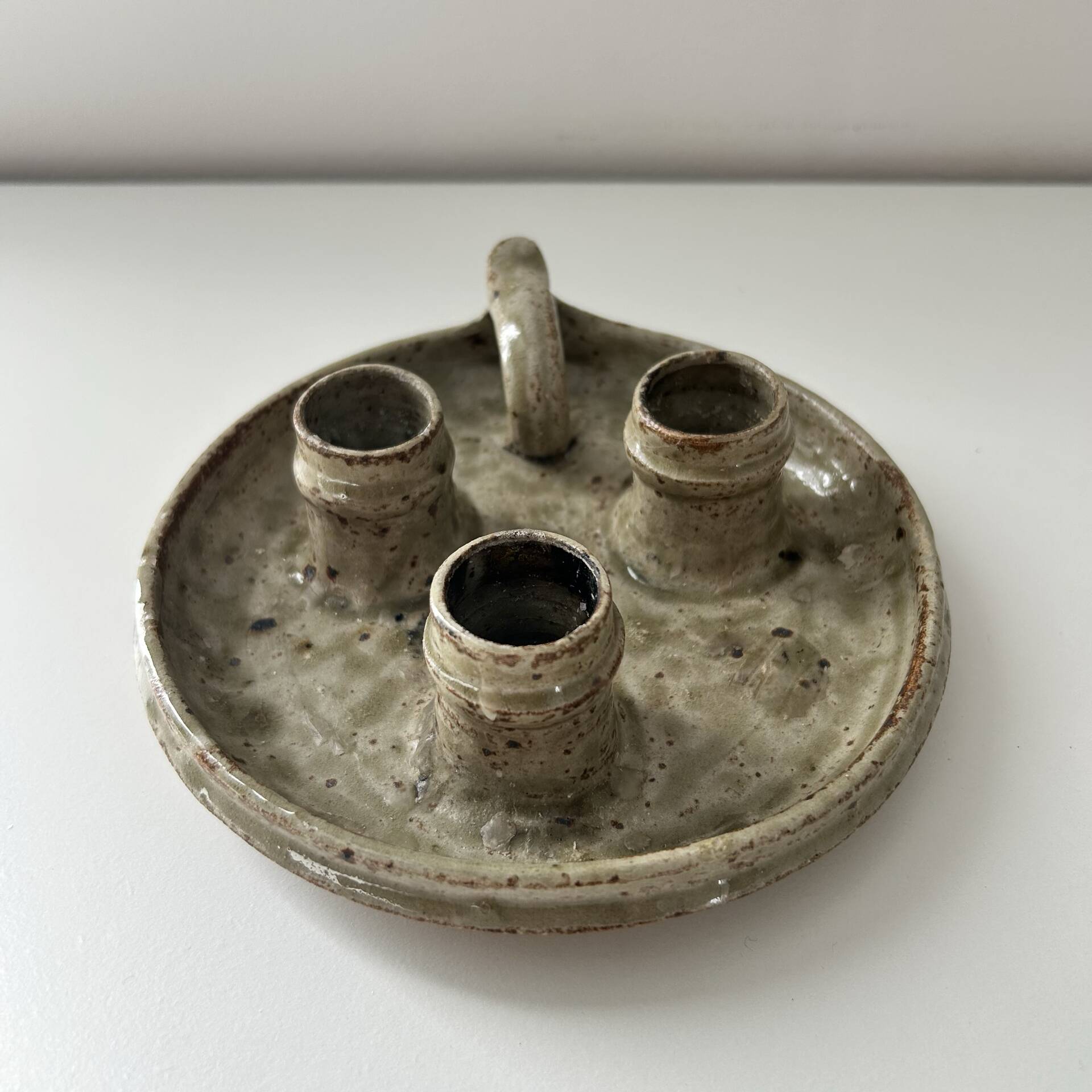 Unusual candlestick with 3 candle holders