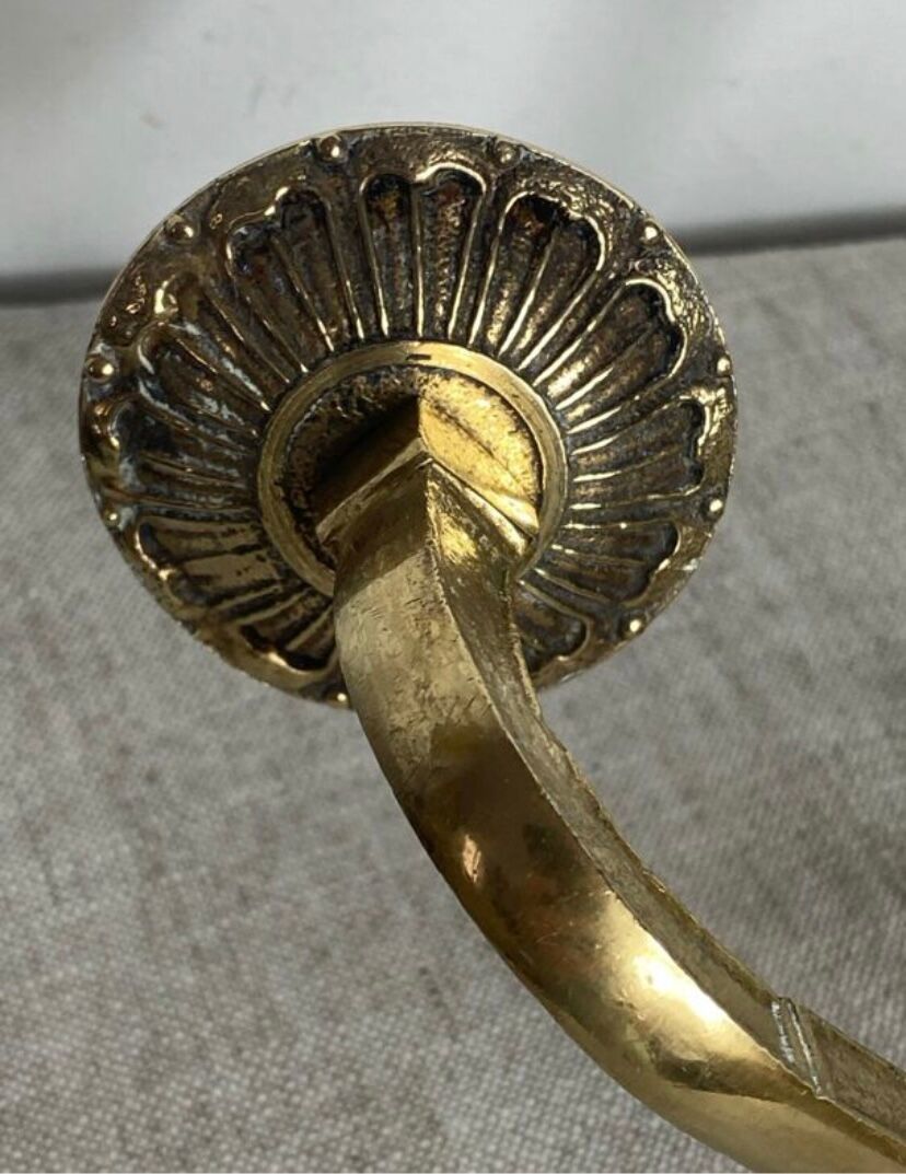 Pair of wall candle holders in bronze