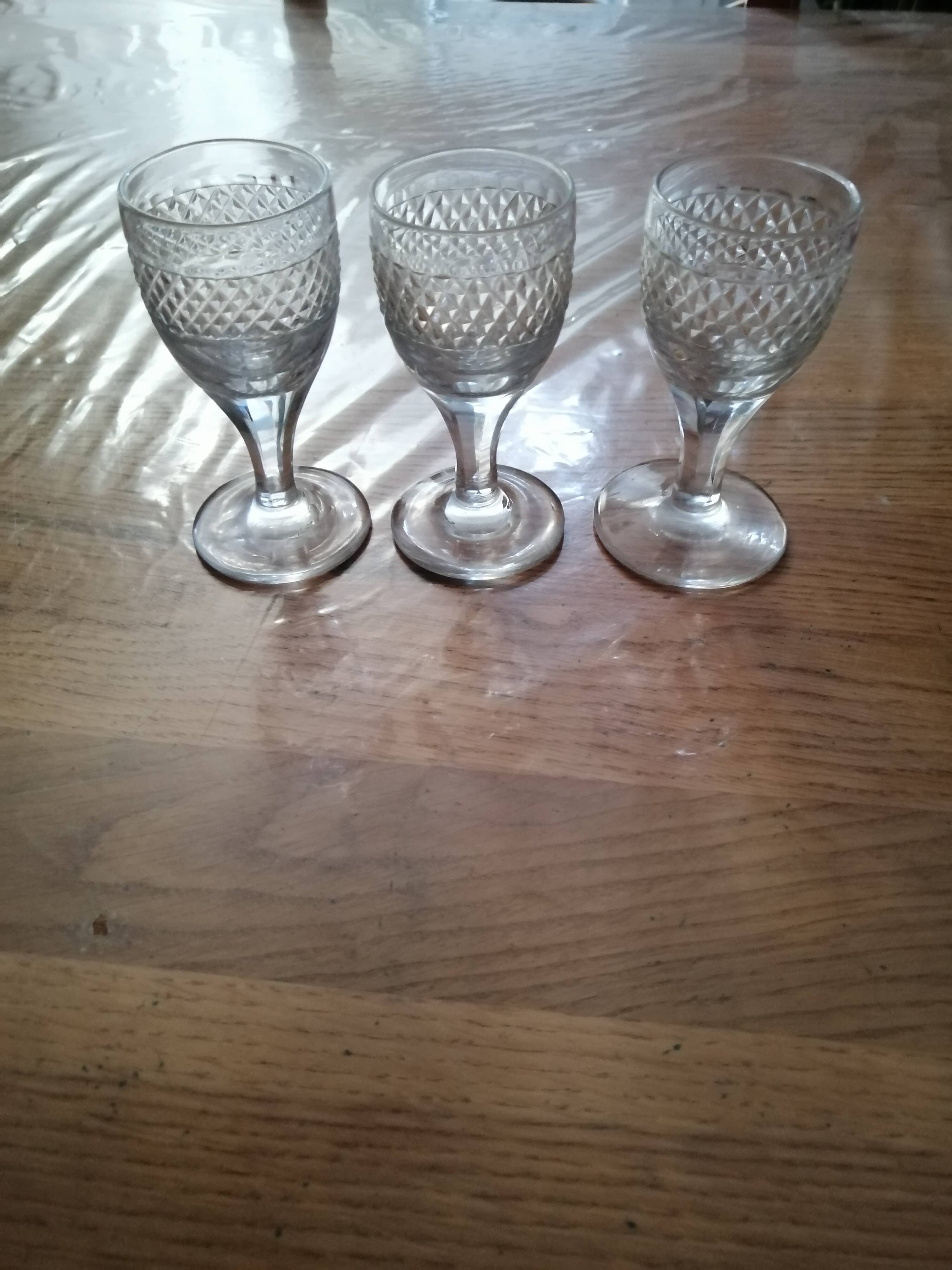 3 old vintage glass on feet