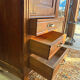 Antique Parisian wardrobe with mirror, hanging space and drawers.