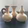 Trio of terracotta vases