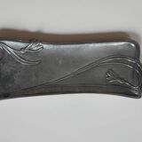 Art Nouveau pocket emptier