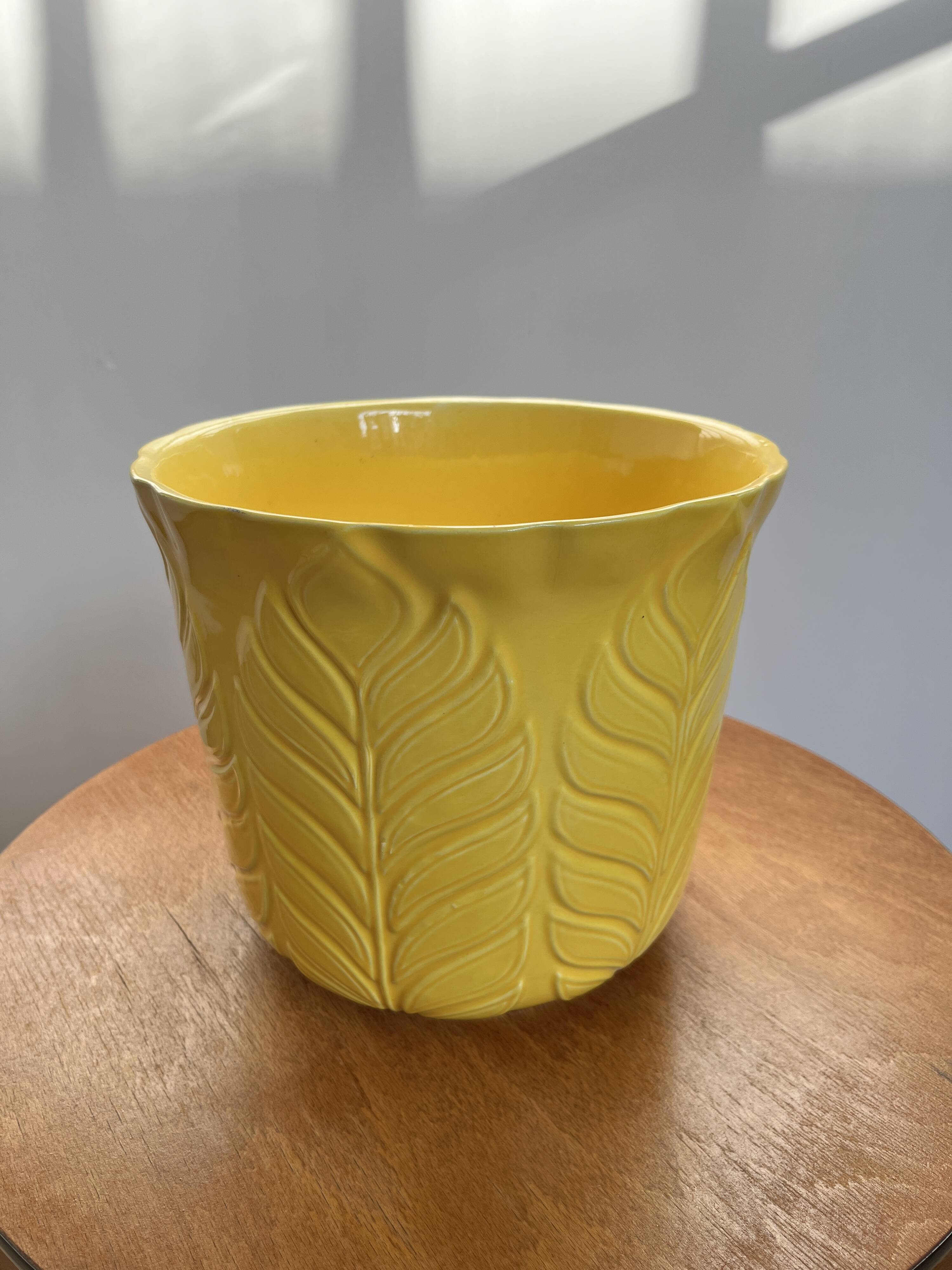 Yellow ceramic plant pot