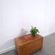Vintage teak Danish chest with a lid on wheels, toy chest.