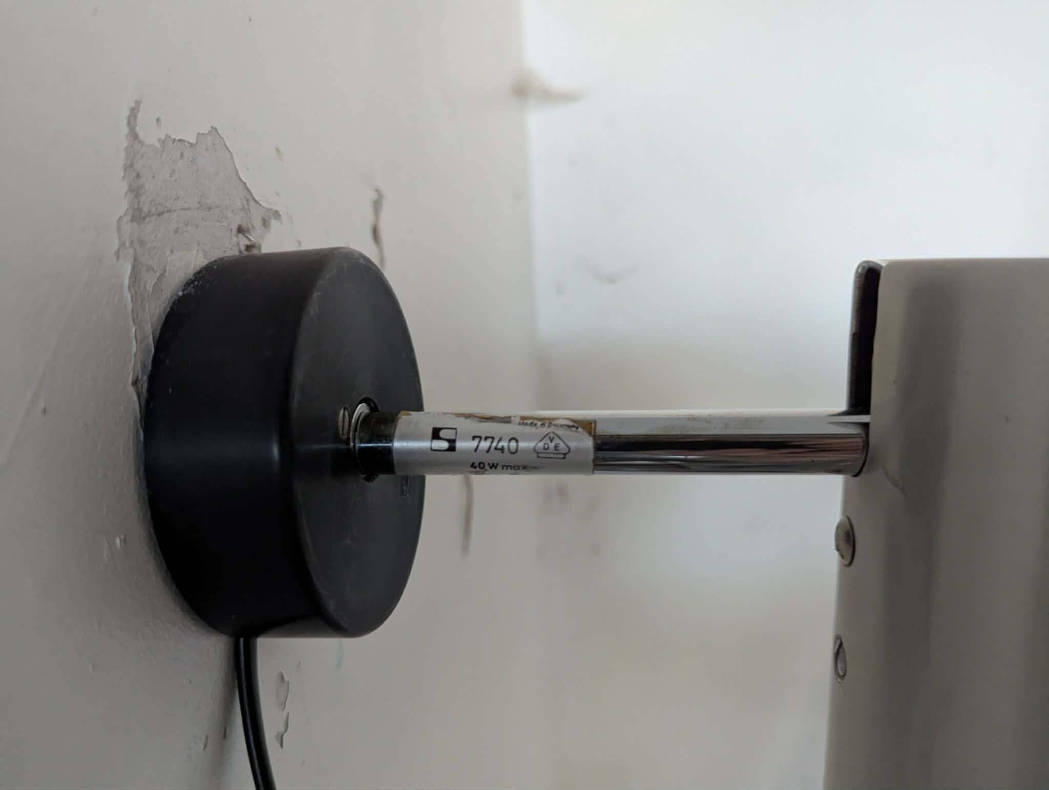 Pair of brushed aluminium tube wall lights from the 70s.