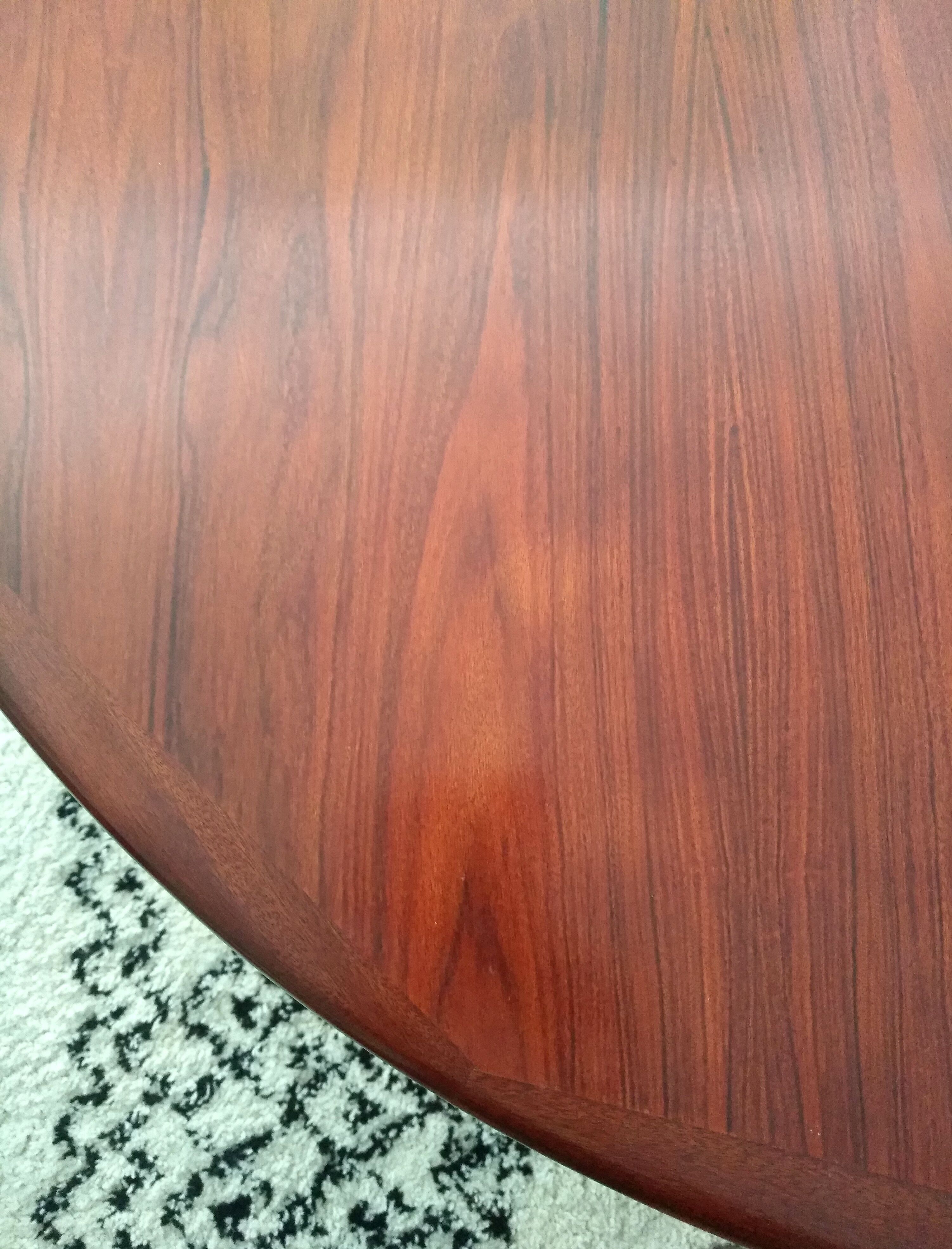 Danish extendable round table on central support