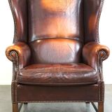 Fauteuil à oreilles classique et majestueux en cuir de mouton avec de jolies couleurs