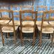 8 antique Vendée straw chairs in solid cherry wood.