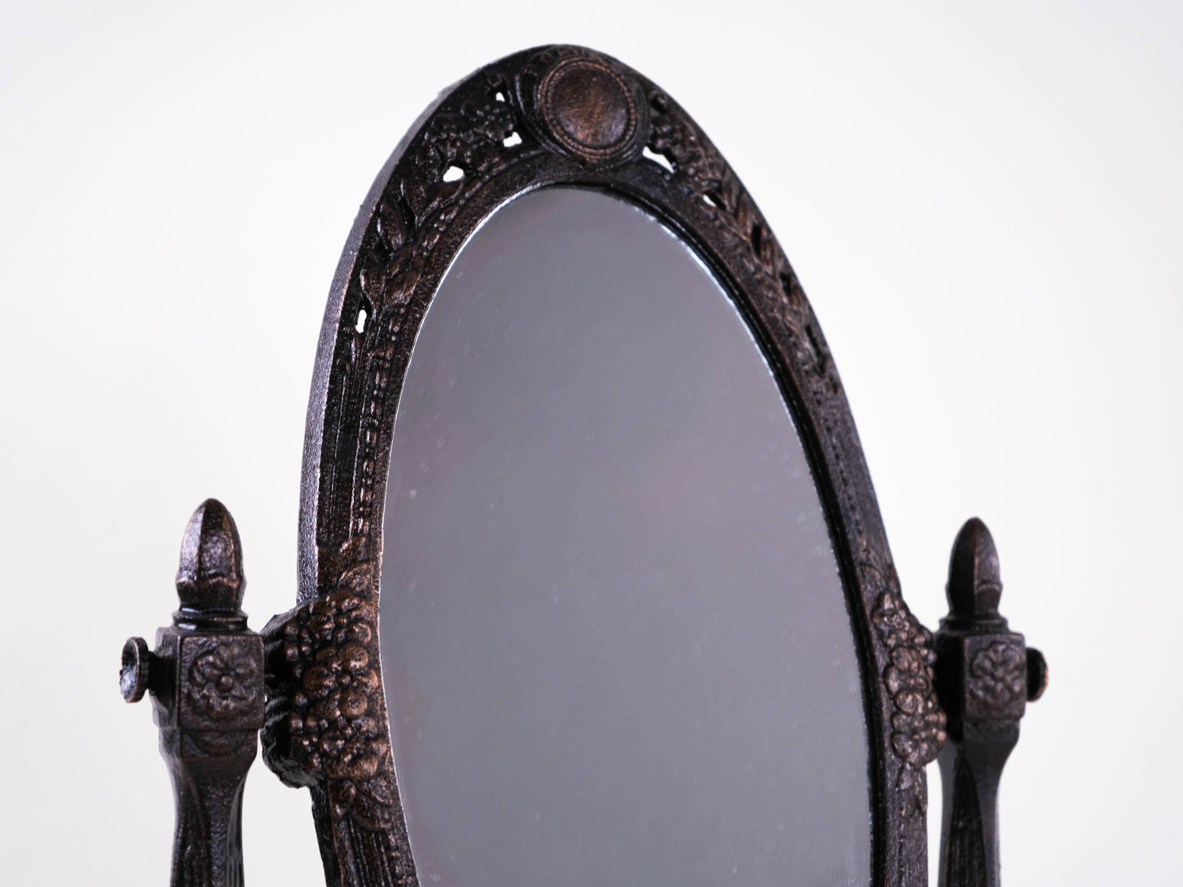 Art Nouveau table mirror with ornamental metal frame, early 20th century