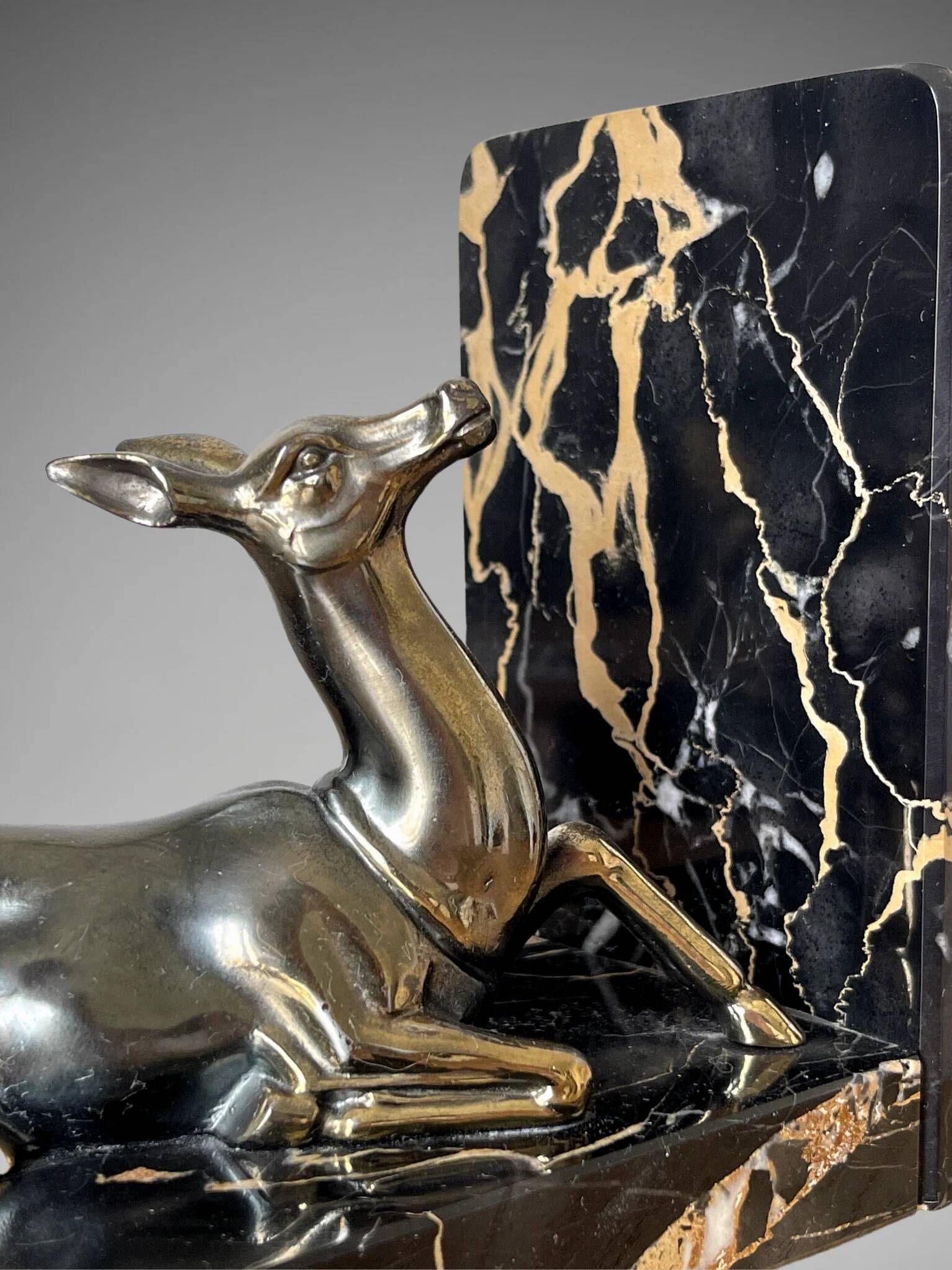 Pair of deer bookends in black marble and gold metal – Art Deco style