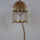 Vintage wallmounted brass lamp from a ship.