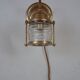 Vintage wallmounted brass lamp from a ship.