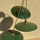 Trio of vintage green enamelled sheet metal lampshade pendants
