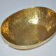 Empty hammered brass pocket