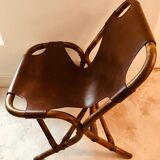 Pair of leather and bamboo armchairs