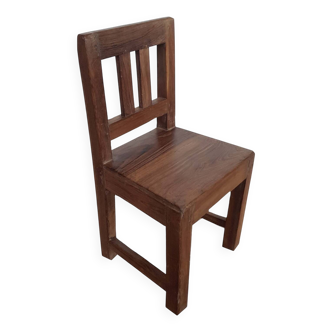 Old children's chair in solid teak