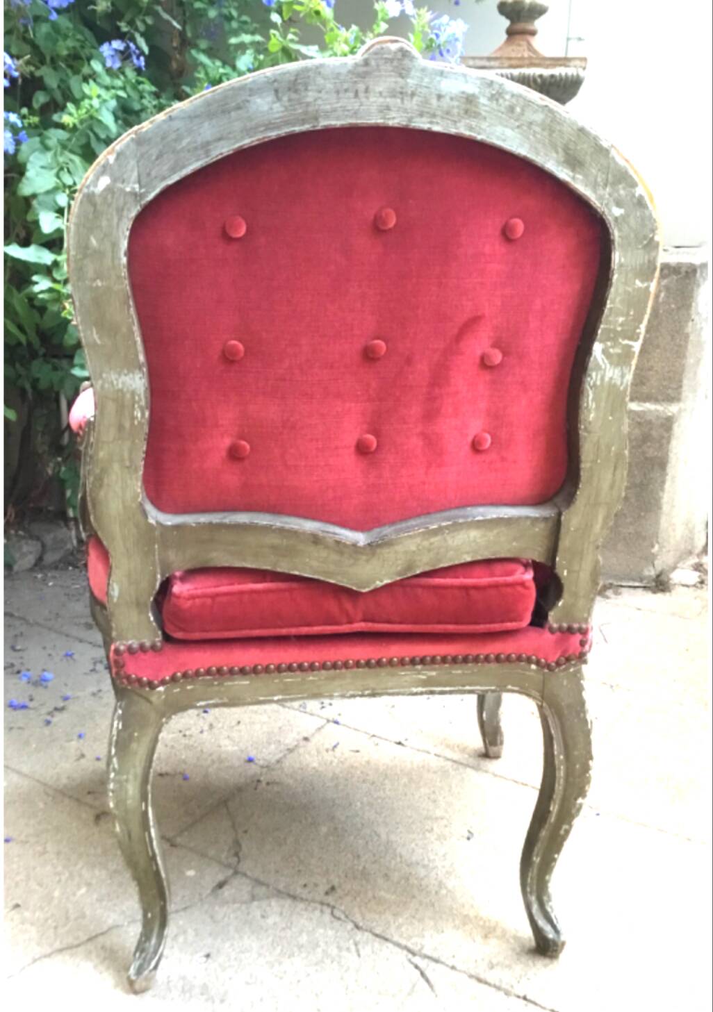 Louis XV style armchair in molded and carved wood with gray and gold patina