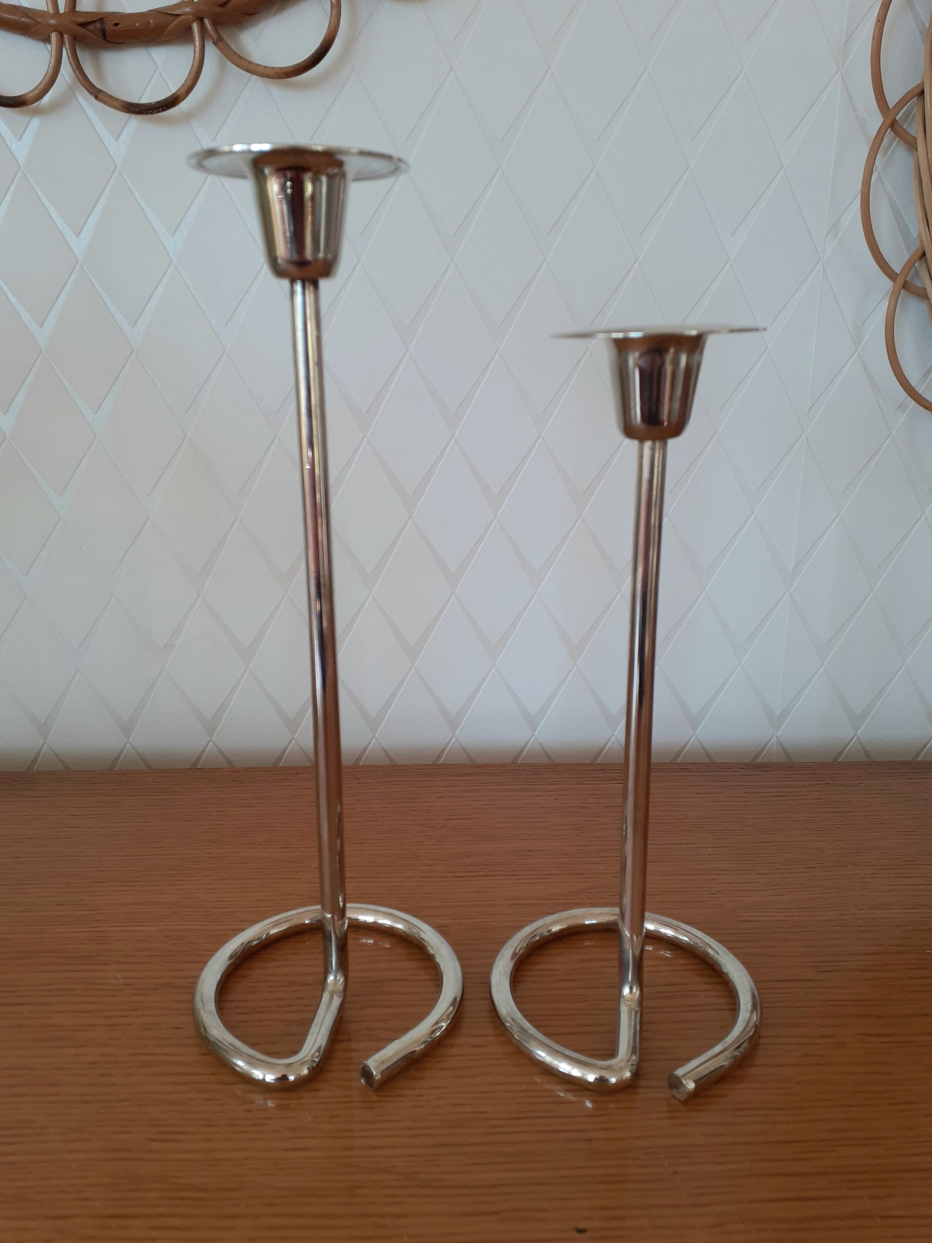 Pair of silver metal candle holders