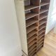 Large antique workshop cabinet with patinated wooden compartments, 20th century.