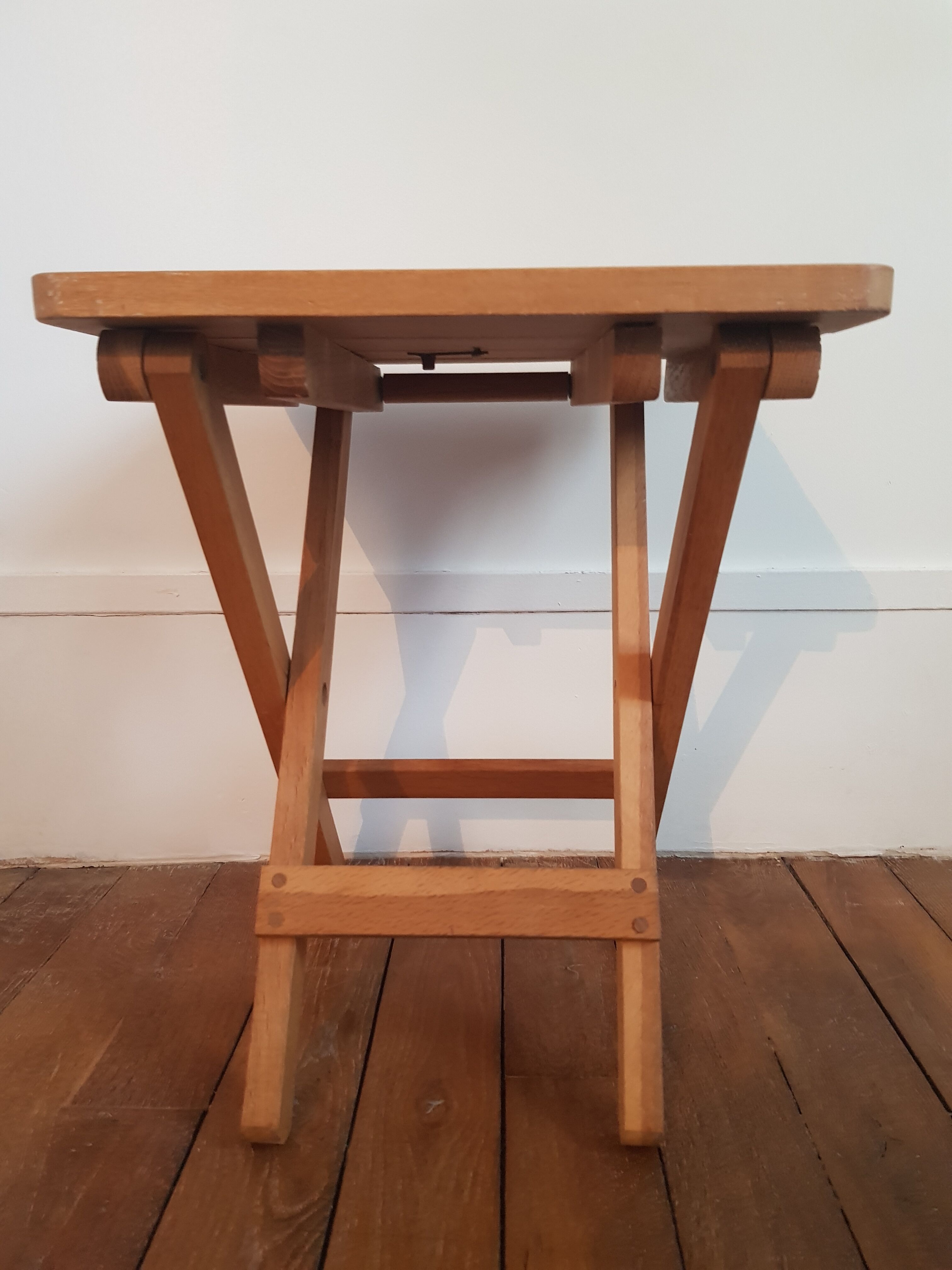 Folding stool made of solid wood