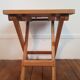 Folding stool made of solid wood