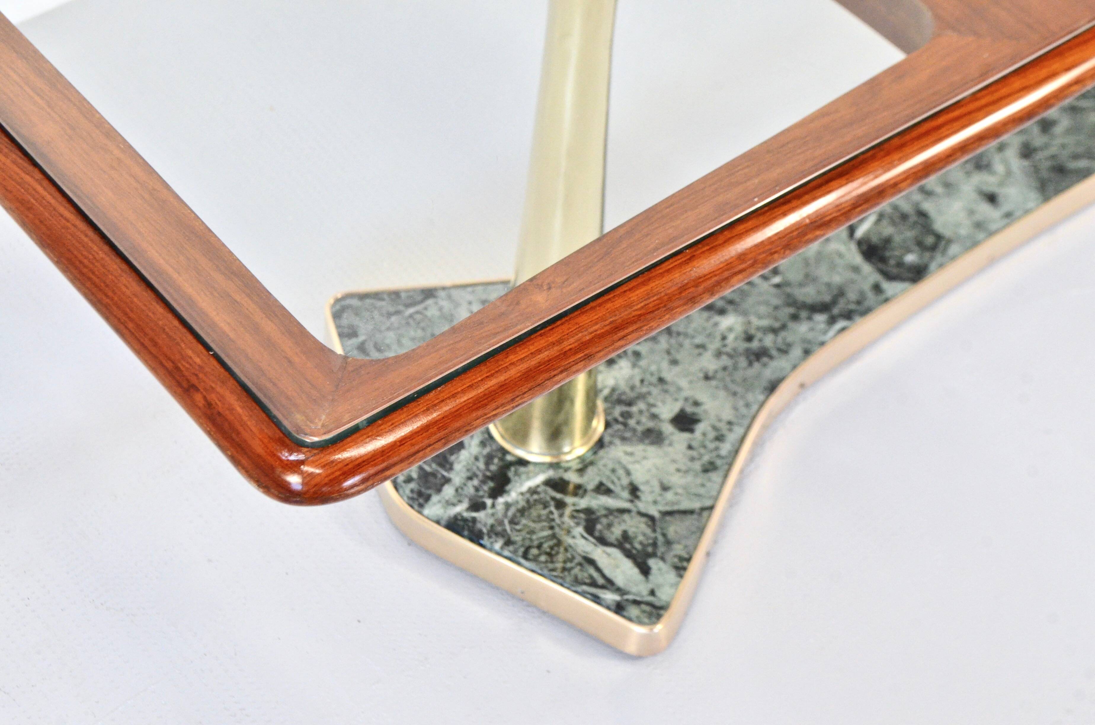 Table à manger italienne du milieu du siècle en acajou, laiton et marbre. Fr