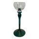 crystal wine glass on green stem