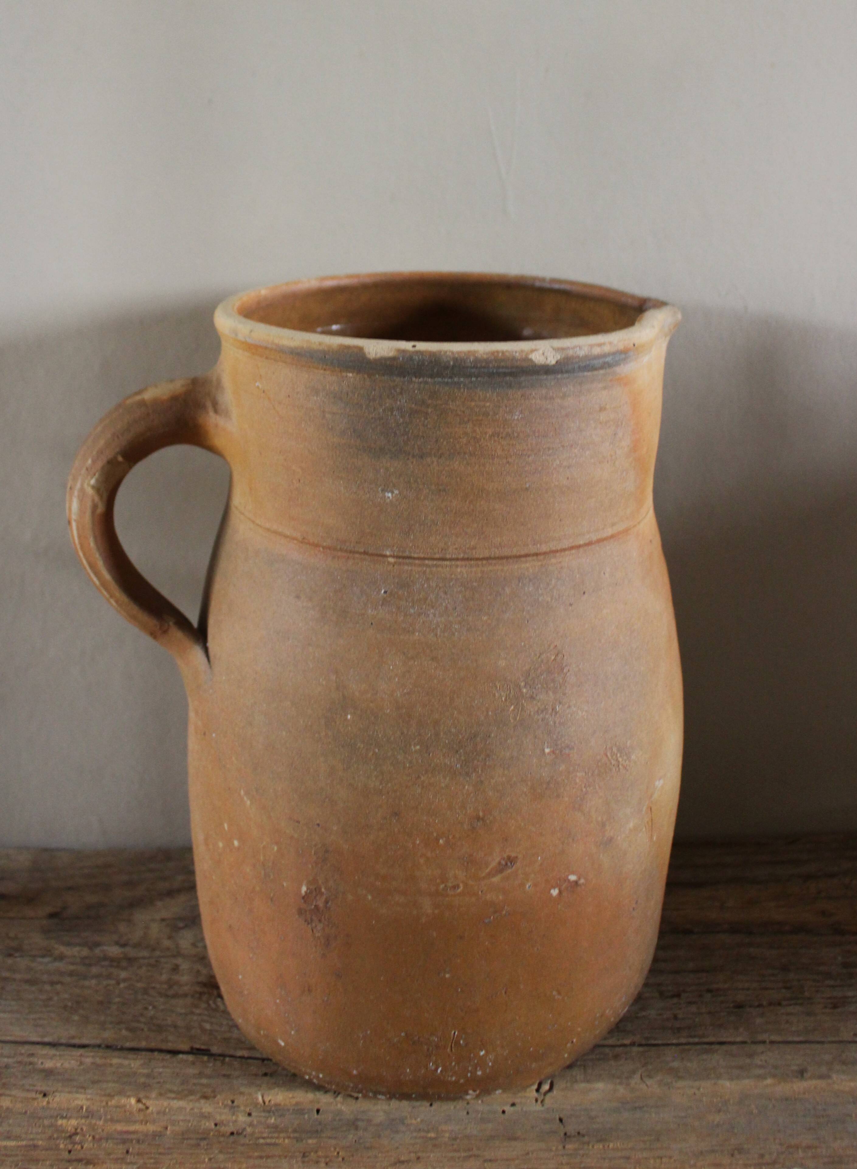 Vintage artisanal terracotta jug