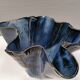 Very special vase in “folded” bluish glazed clay.