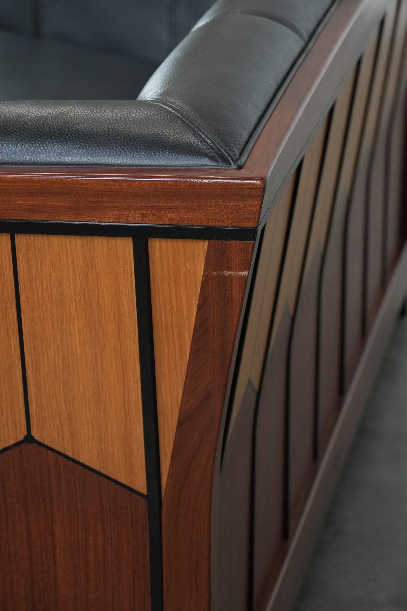 Art Deco  black leather 2.5-seater design sofa with beautiful woodwork