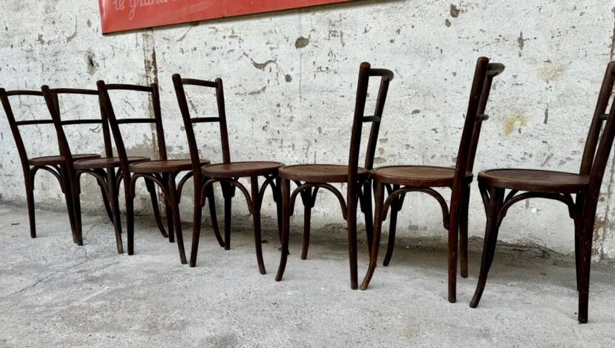 Set of 7 old Baumann bistro chairs in curved wood with round seat