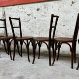 Série de 7 anciennes chaises bistrot Baumann bois courbé assise ronde