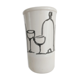 Vase decorated in hollows of bottles and glasses