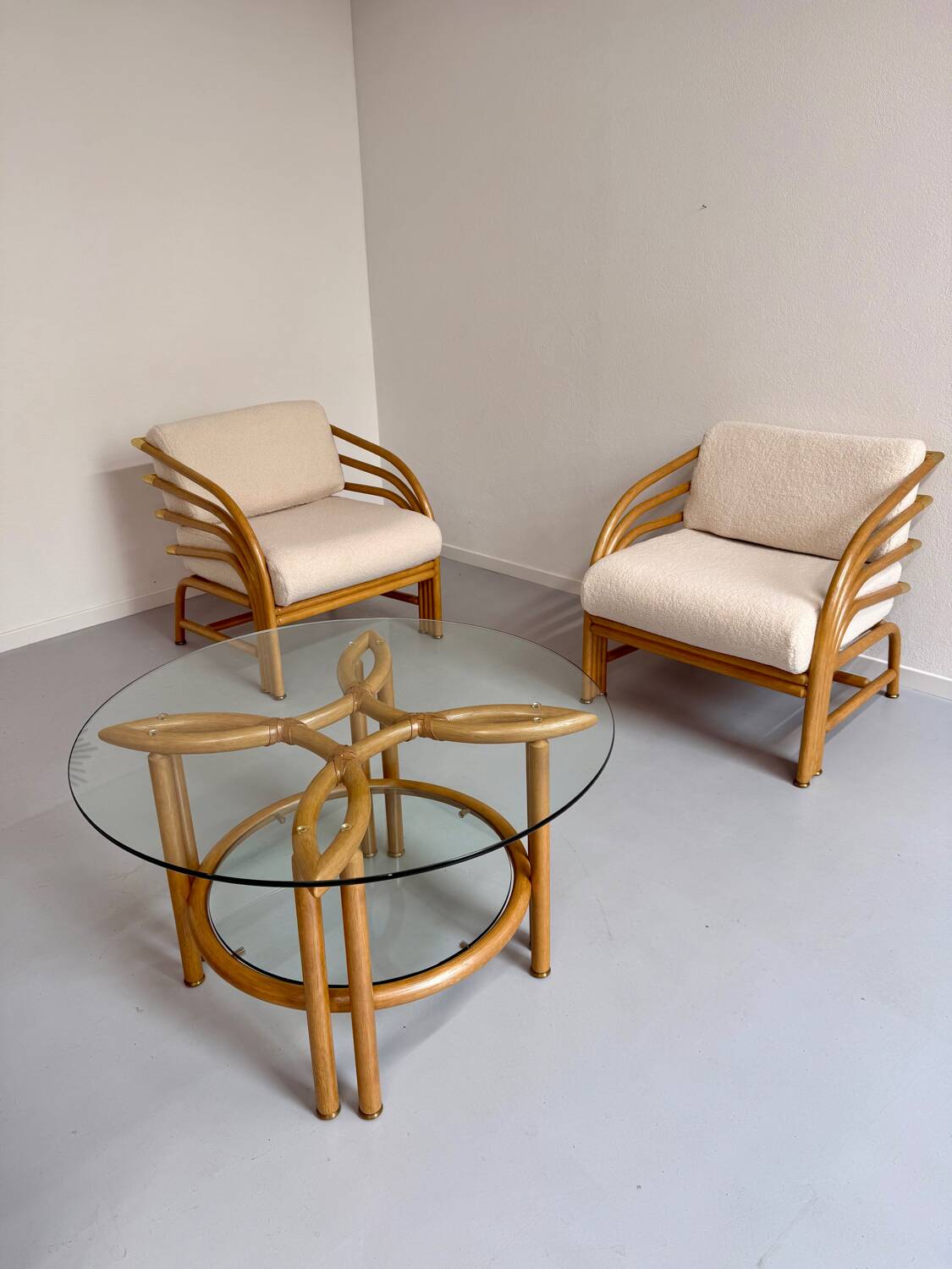 Complete living room with rattan sofa and white bouclette, brass finish, 80's design