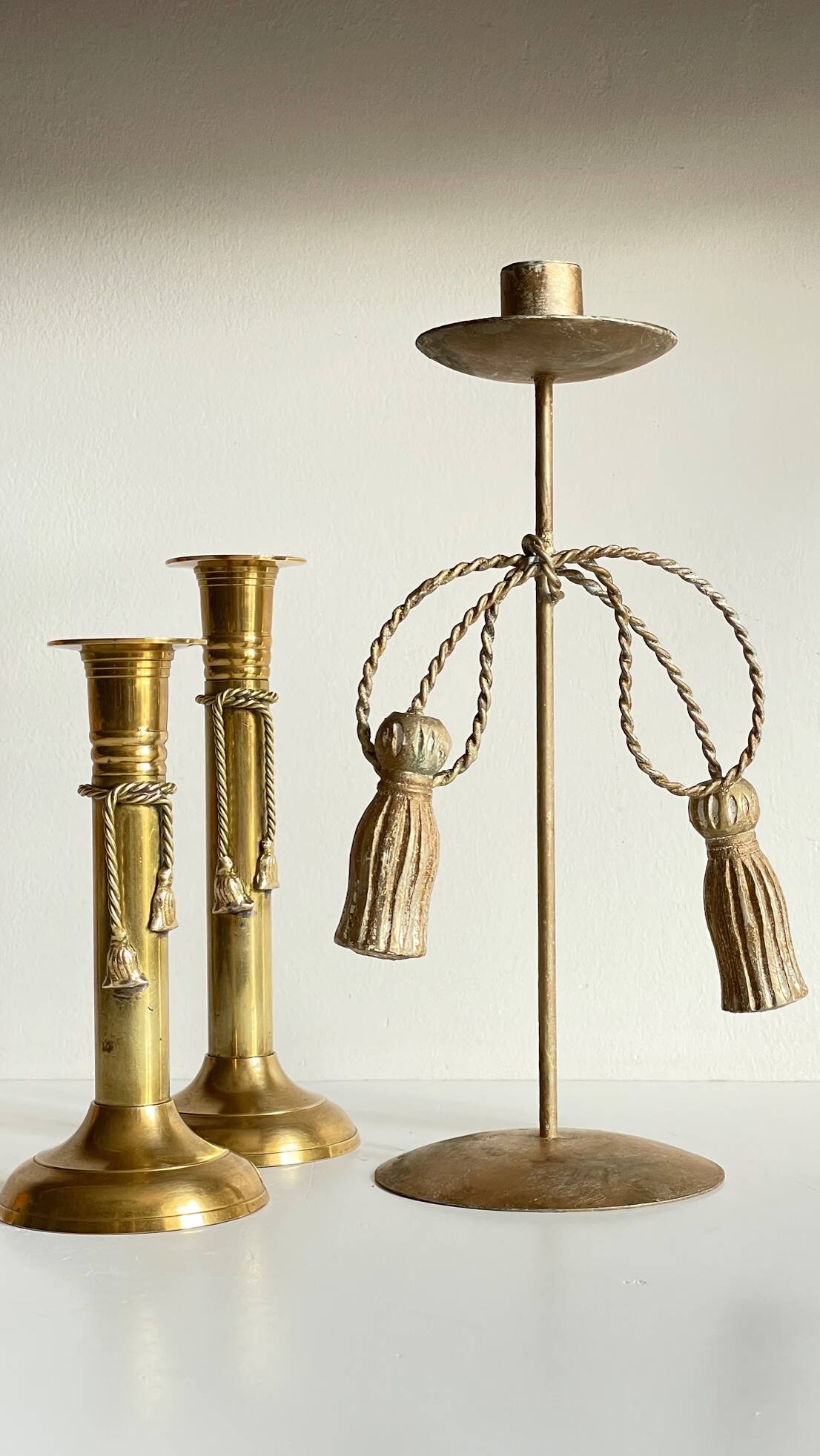 Trio of vintage knotted candlesticks brass