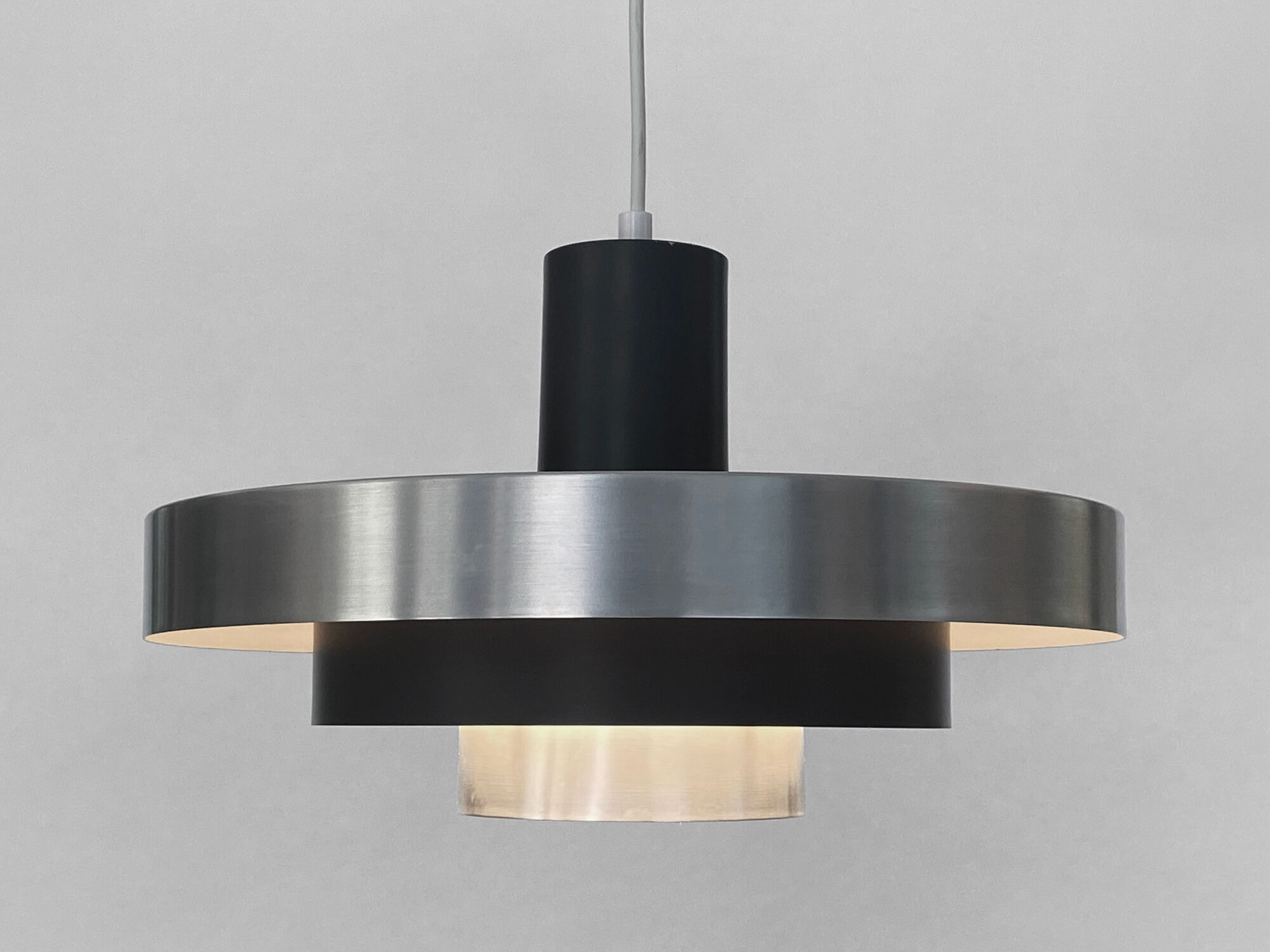 Layered pendant light in brushed aluminum. Denmark 1960s