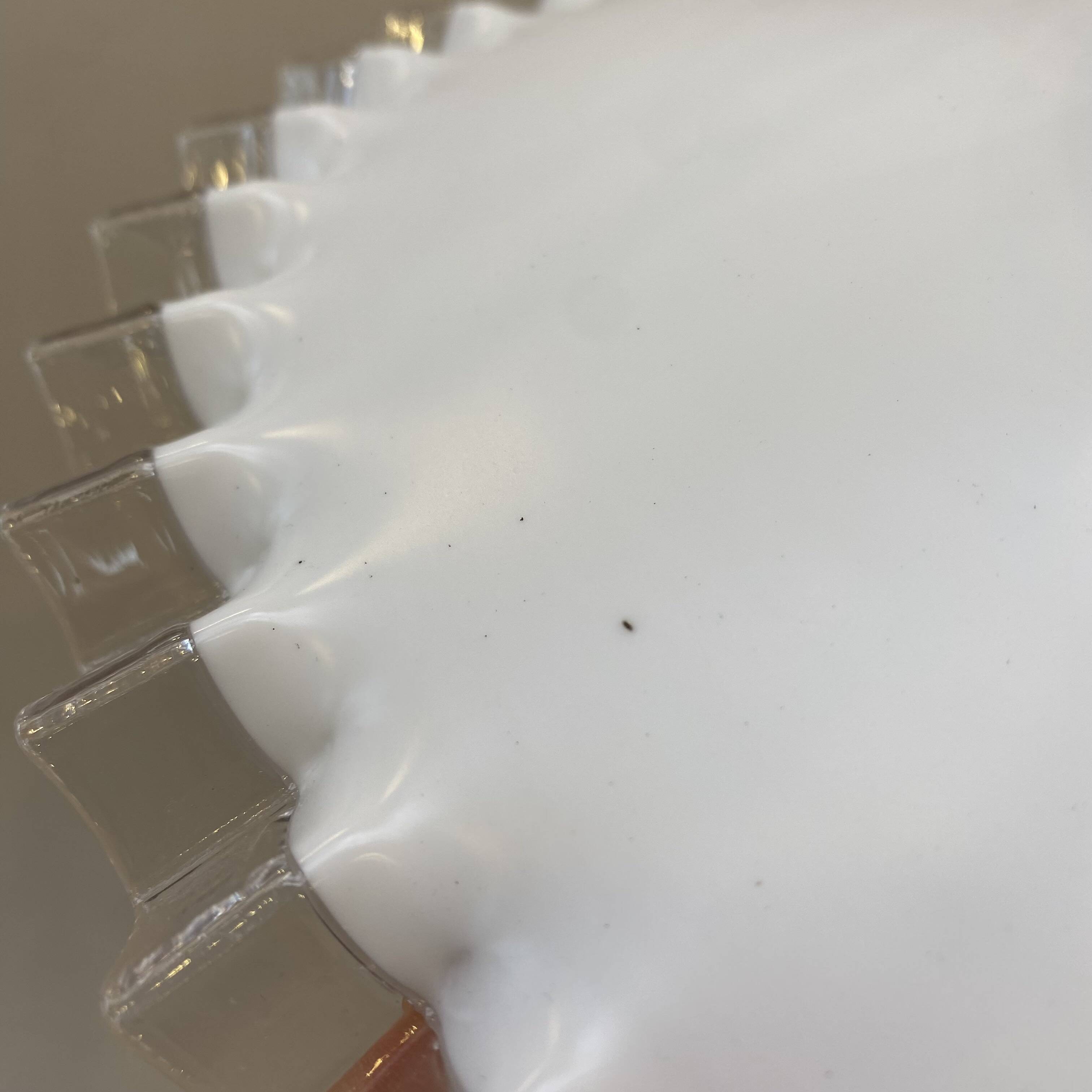 White opaline pendant light with transparent serrated edges