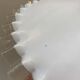 White opaline pendant light with transparent serrated edges