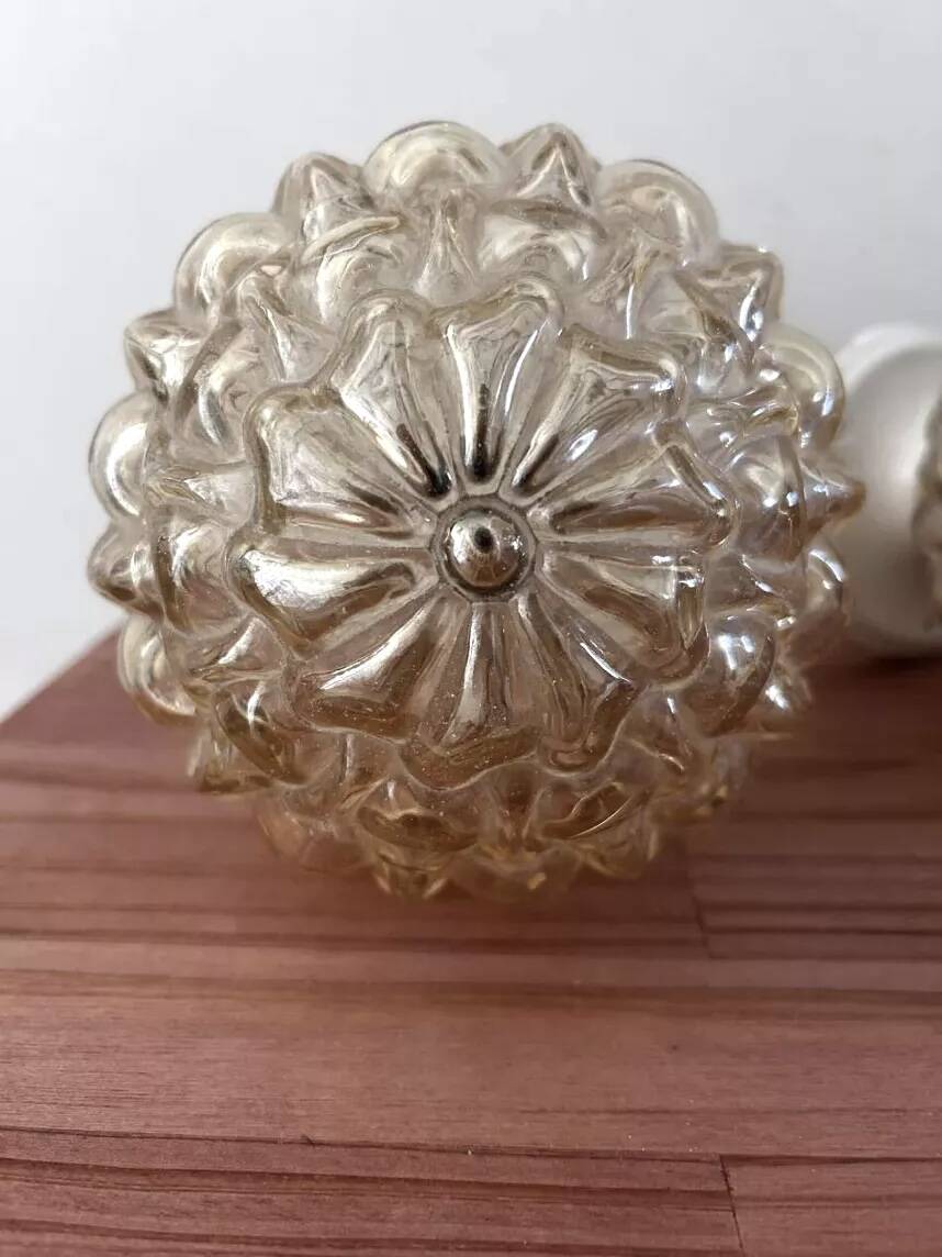 Pair of golden Scandinavian globe wall lights