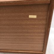 Lacquered 3-drawer chest with rosewood veneer.