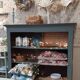 Wood and khaki green bookcase