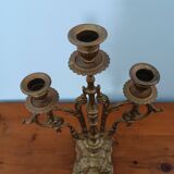 Bronze candlestick with lion head decoration