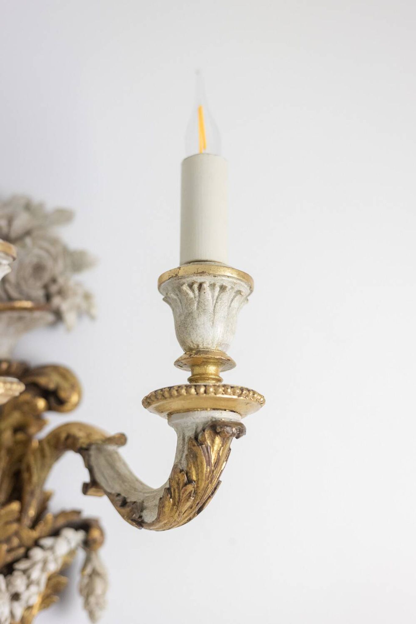 Pair of Louis XVI style wall lights in gilded and lacquered wood. Circa 1900.