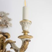 Pair of Louis XVI style wall lights in gilded and lacquered wood. Circa 1900.