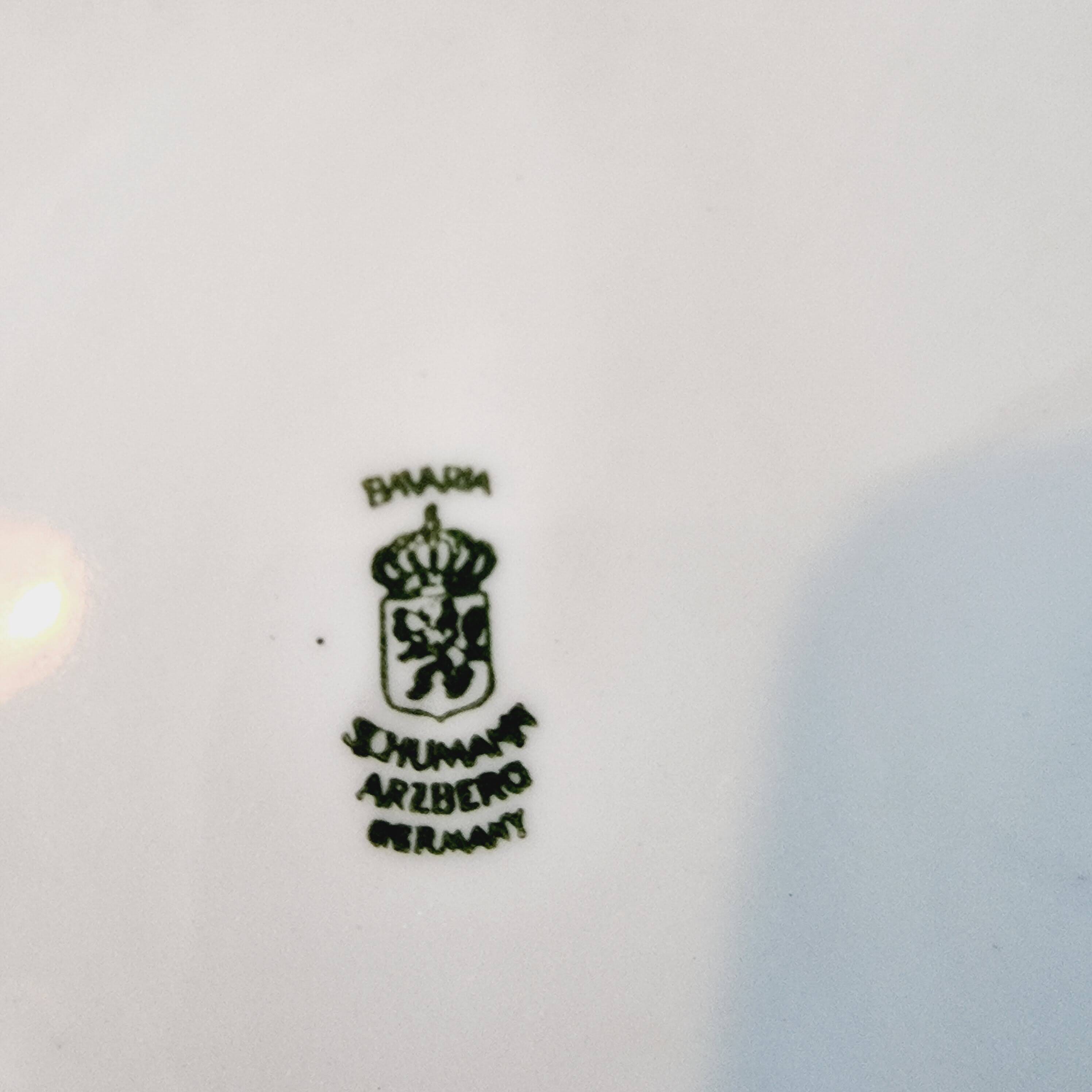 Large serving plate with romantic Frangonard scene with 24 carat gold