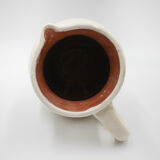 White pitcher in glazed stoneware