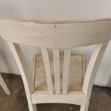Set of 6 mismatched white chairs